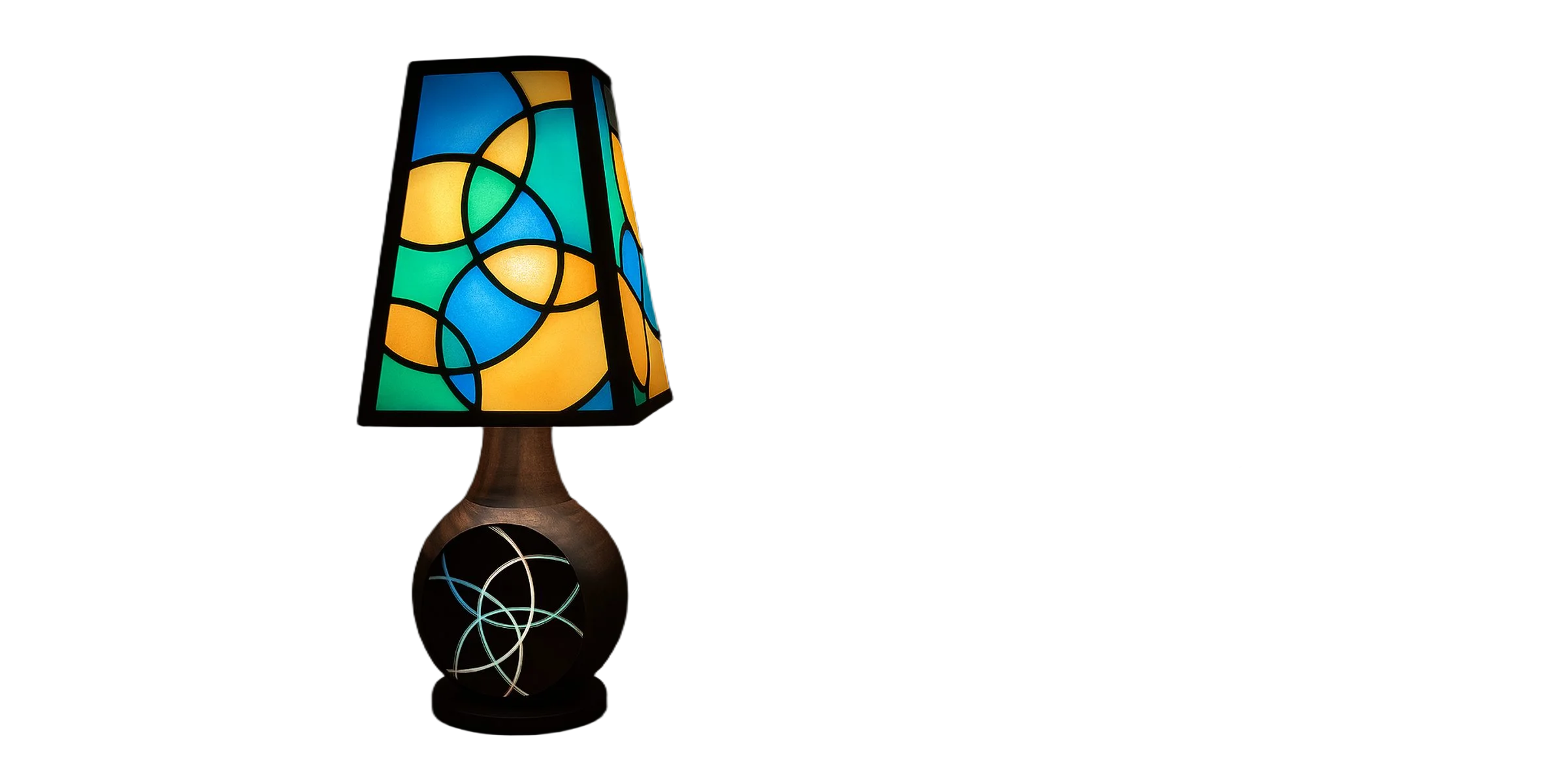 Complete walnut epoxy lamp with a colorful shade and curved inlay lines on its base, against a black background