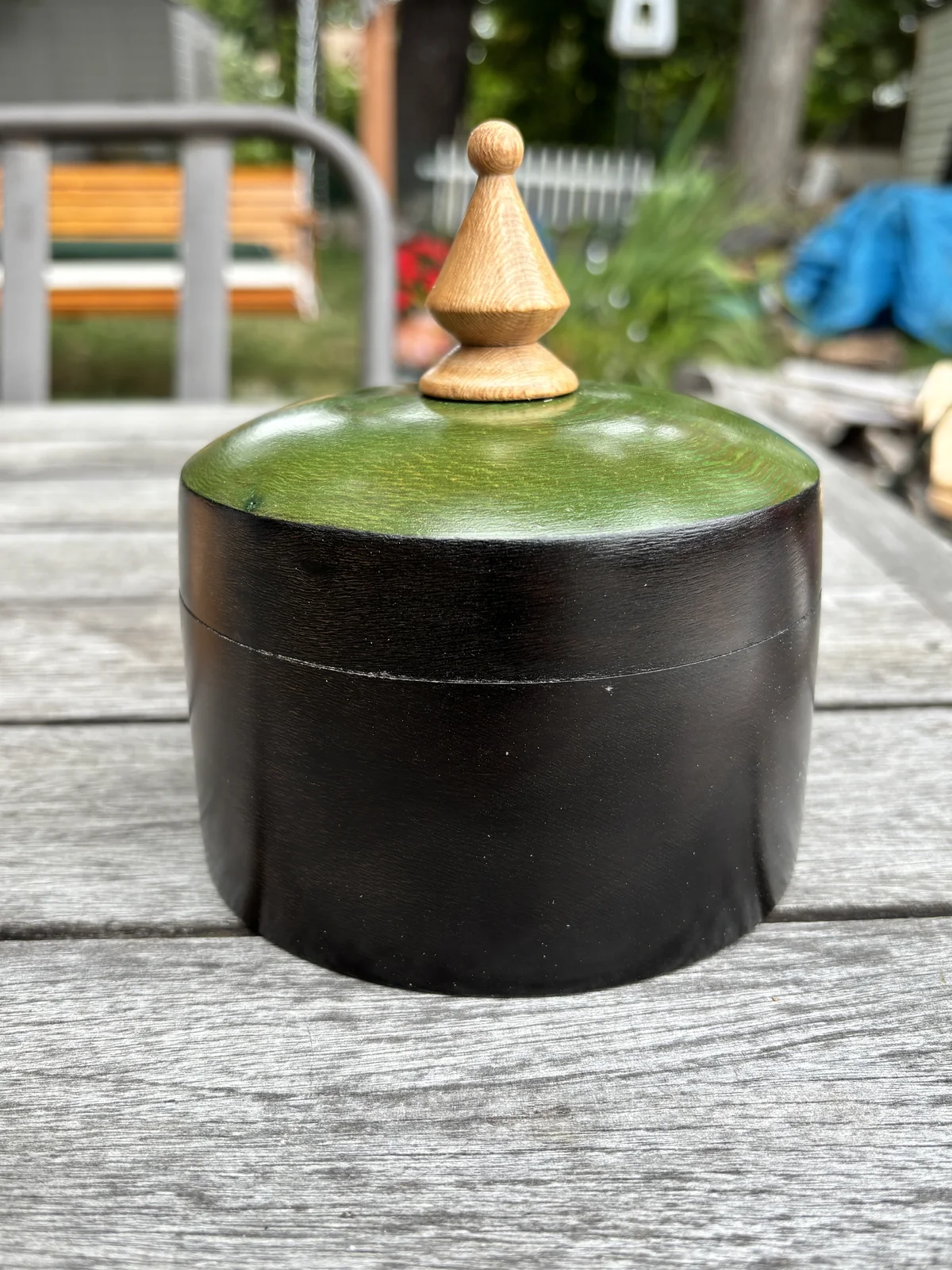 Ebonized London plane lidded box with a green dyed lid and natural wood finial